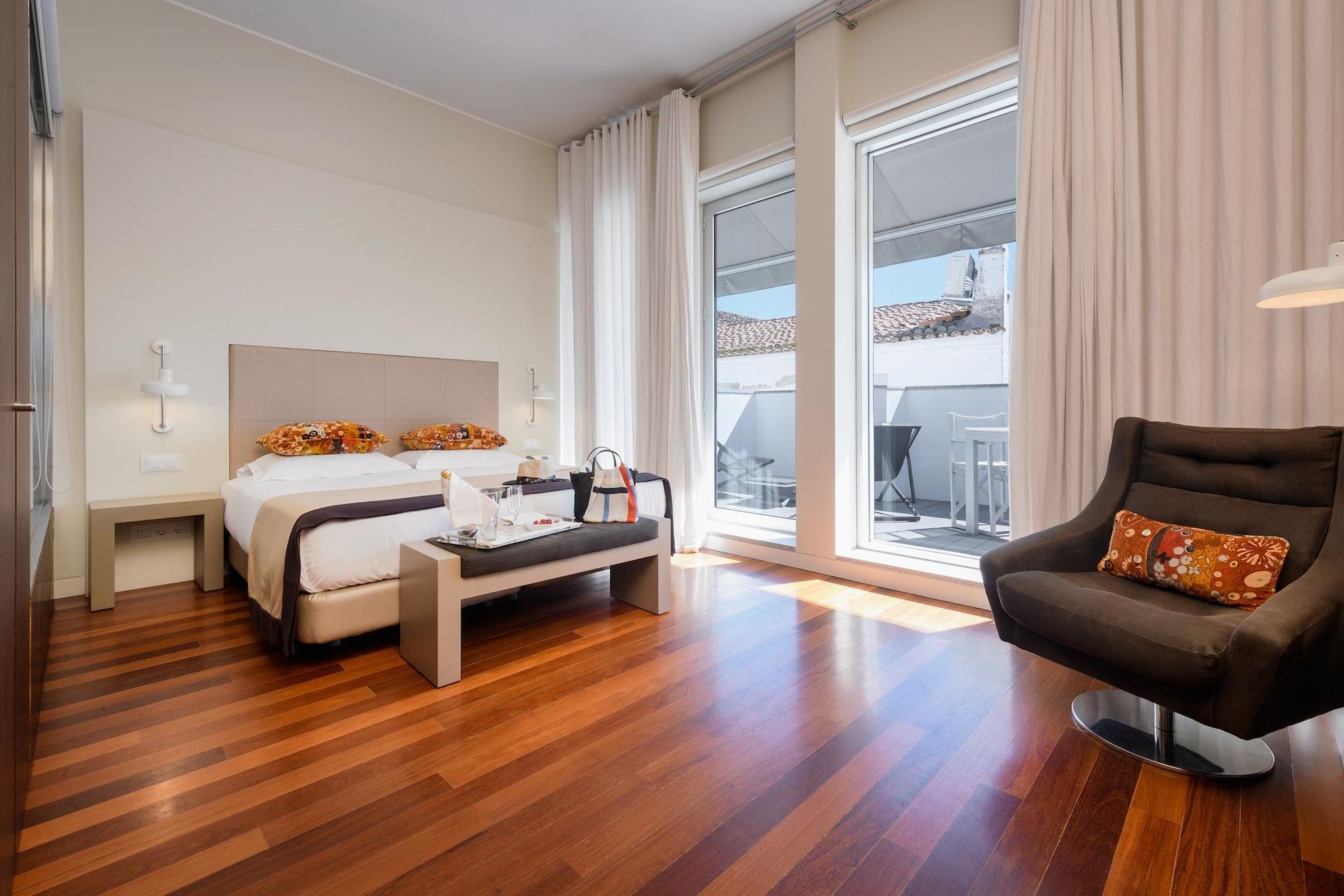 M'Ar De Ar Aqueduto Hotel เอโวรา ภายนอก รูปภาพ A room at the hotel
